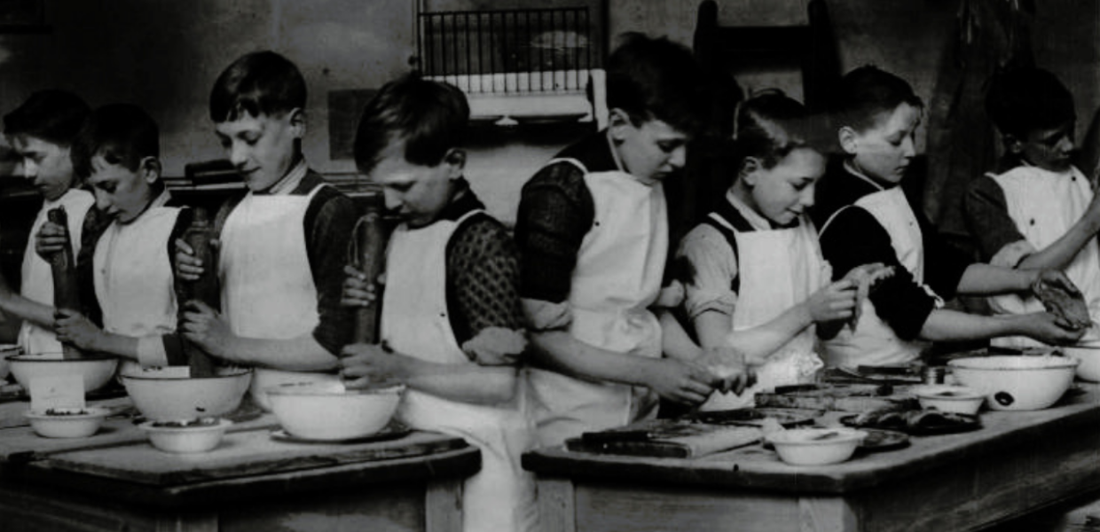A group of children in a cooking class